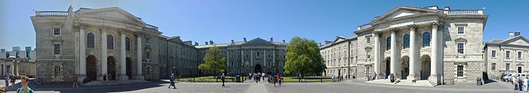 A panorama taken from Parliament Square. The row of buildings is framed by the Public Theatre on the left and the Chapel on the right. In the middle lies Regent House with its archway leading to the Front Gate (Image from Wikipedia)